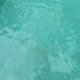 Cloudy pool water after heavy rain in Oahu showing reduced visibility and debris buildup